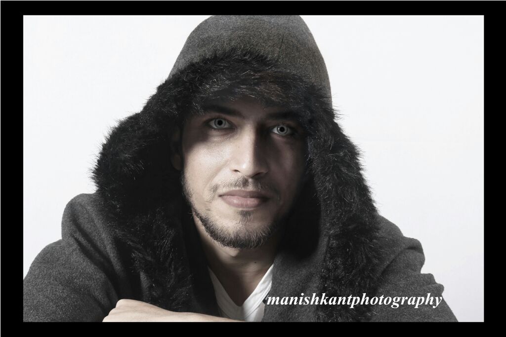 Male portrait hooded
